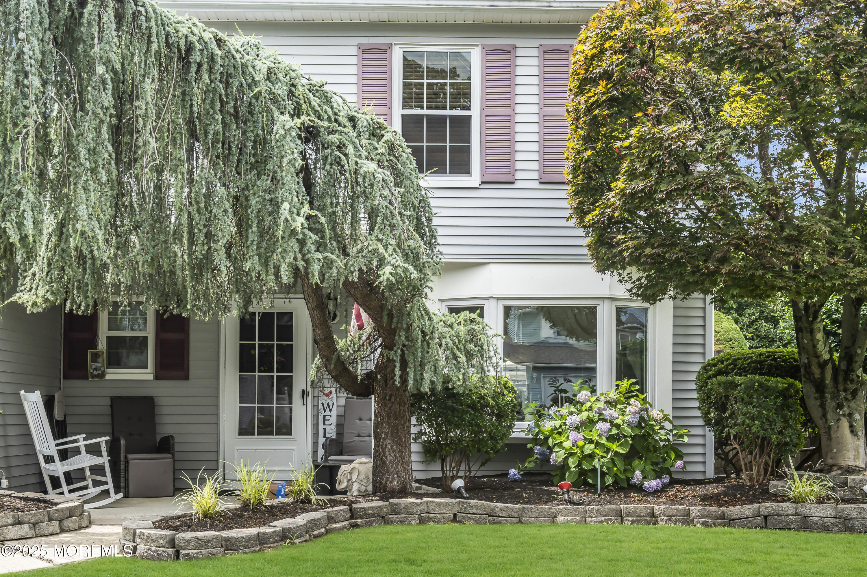 9 Yellowstone Lane Howell, NJ 07731 - Photo 3 of 37 a front view of a house with garden