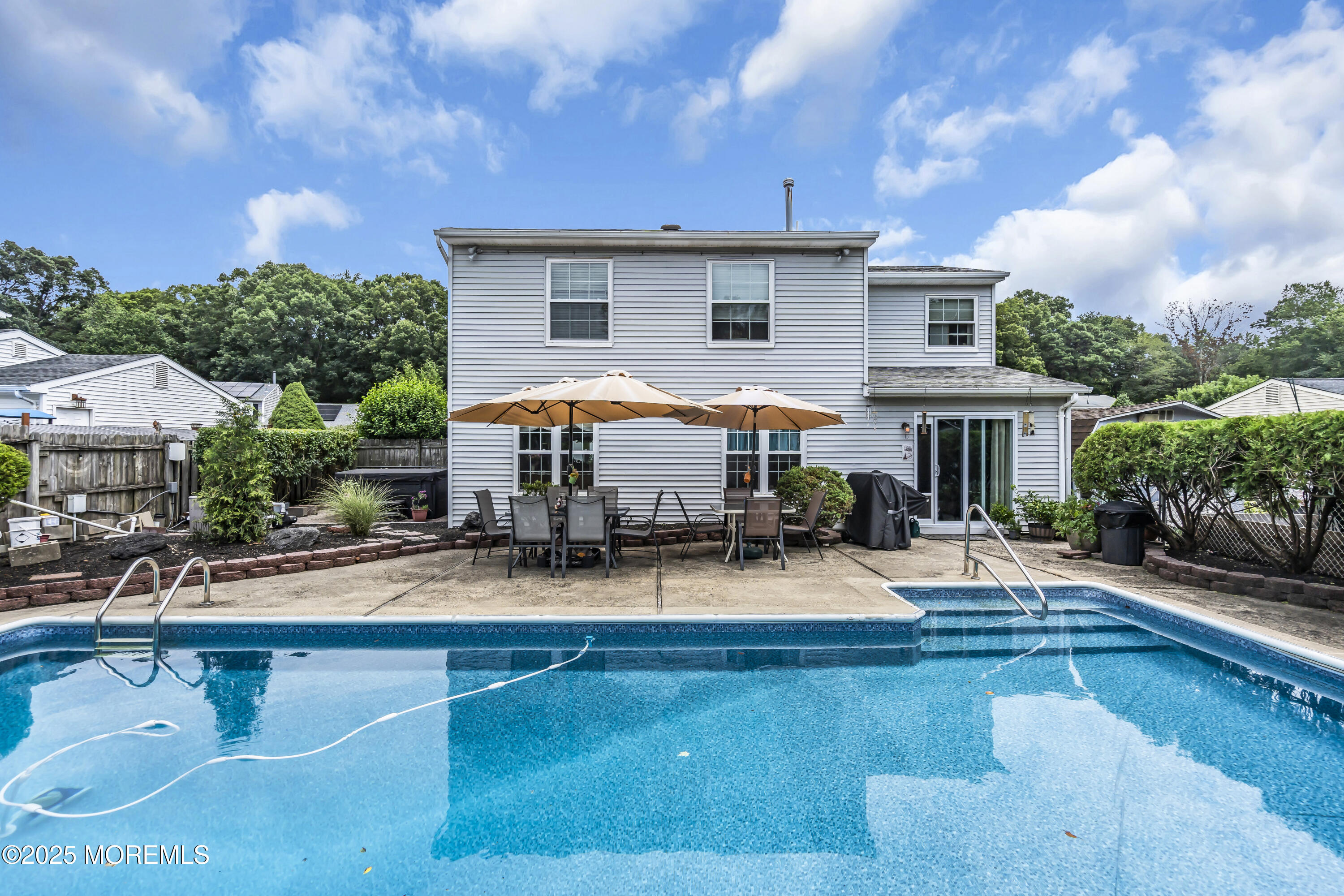9 Yellowstone Lane Howell, NJ 07731 - Photo 36 of 37 a view of house with outdoor space and swimming pool