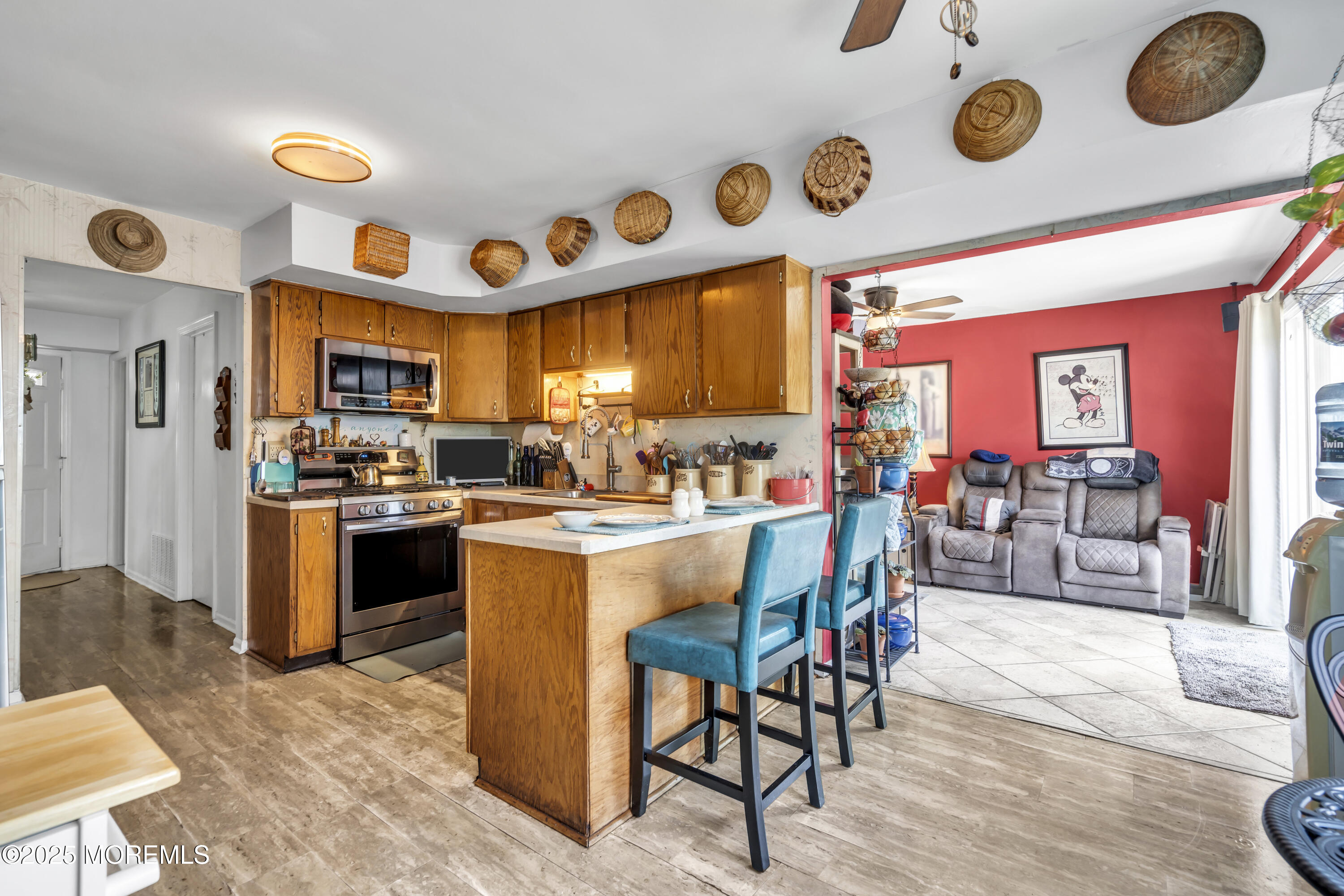 9 Yellowstone Lane Howell, NJ 07731 - Photo 10 of 37 a kitchen with stainless steel appliances granite countertop a stove and a dining table
