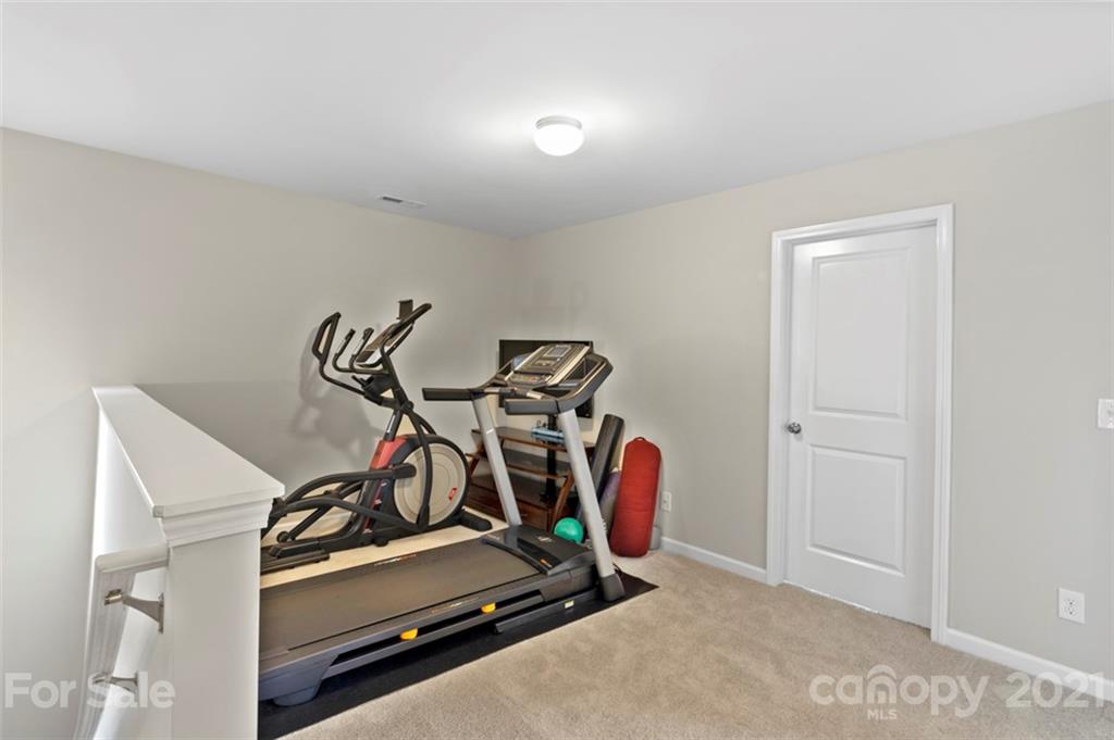 112 Tranquil Court Locust, NC 28097 - Photo 14 of 25 a view of a room with gym equipment