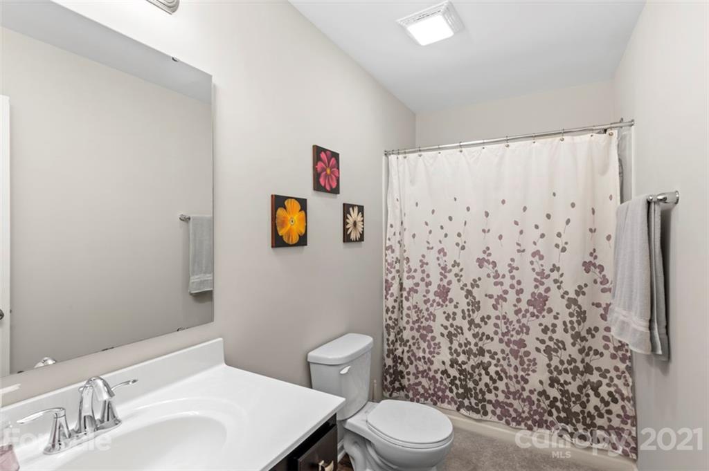 112 Tranquil Court Locust, NC 28097 - Photo 21 of 25 a bathroom with a toilet and a sink