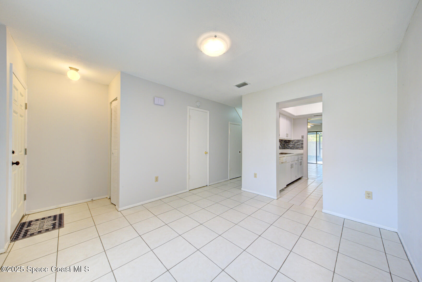 4749 Sisson Road Titusville, FL 32780 - Photo 7 of 30 living room & foyer