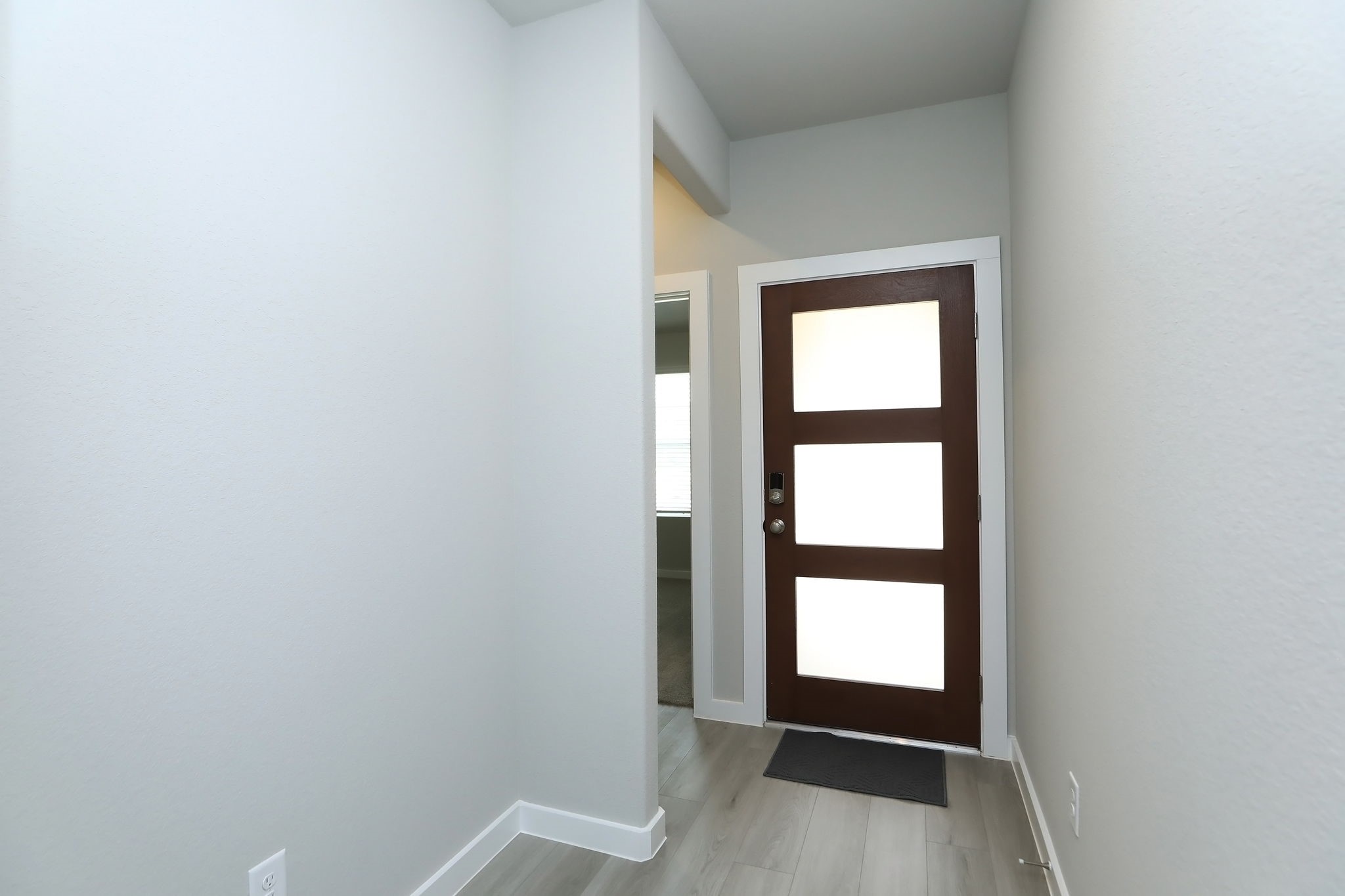 14110 Greystone Ter Street Magnolia, TX 77354 - Photo 3 of 34 There Is Also A Contemporary, Three-Paned Front Door With Obscured Glass For Added Privacy.