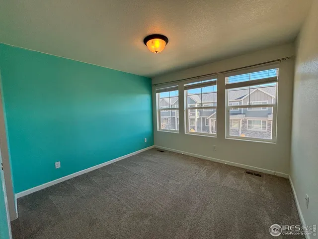 $349,000 | 2461 Stage Coach Drive, Unit A, Milliken, CO 80543