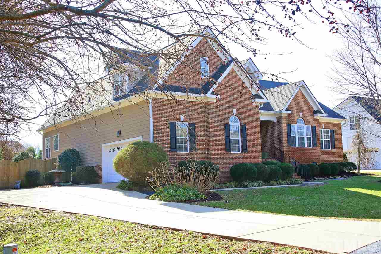 844 Oxen Circle Raleigh, NC 27603 - Photo 2 of 30 a front view of a house with garden