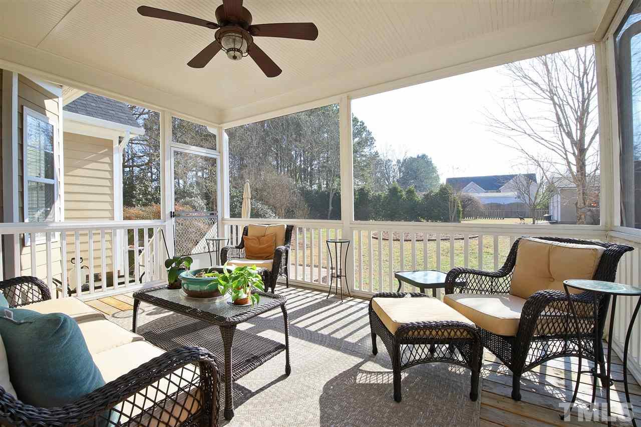 844 Oxen Circle Raleigh, NC 27603 - Photo 19 of 30 a living room with furniture and a large window