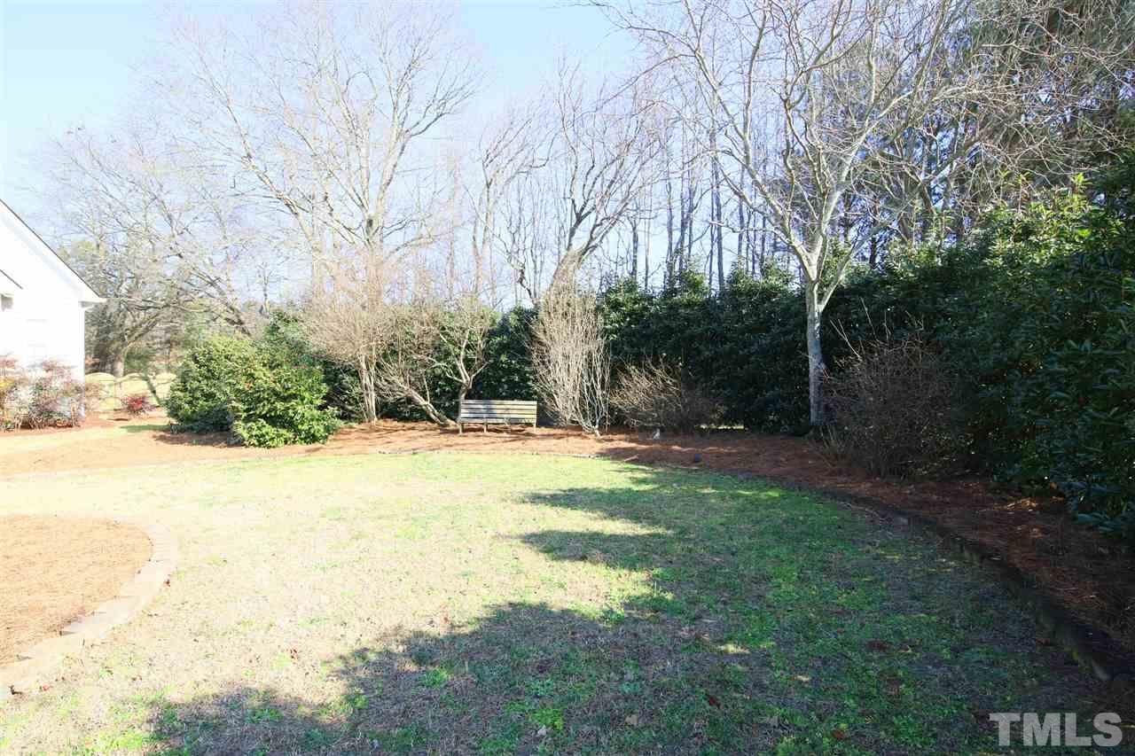844 Oxen Circle Raleigh, NC 27603 - Photo 20 of 30 a view of backyard with large trees