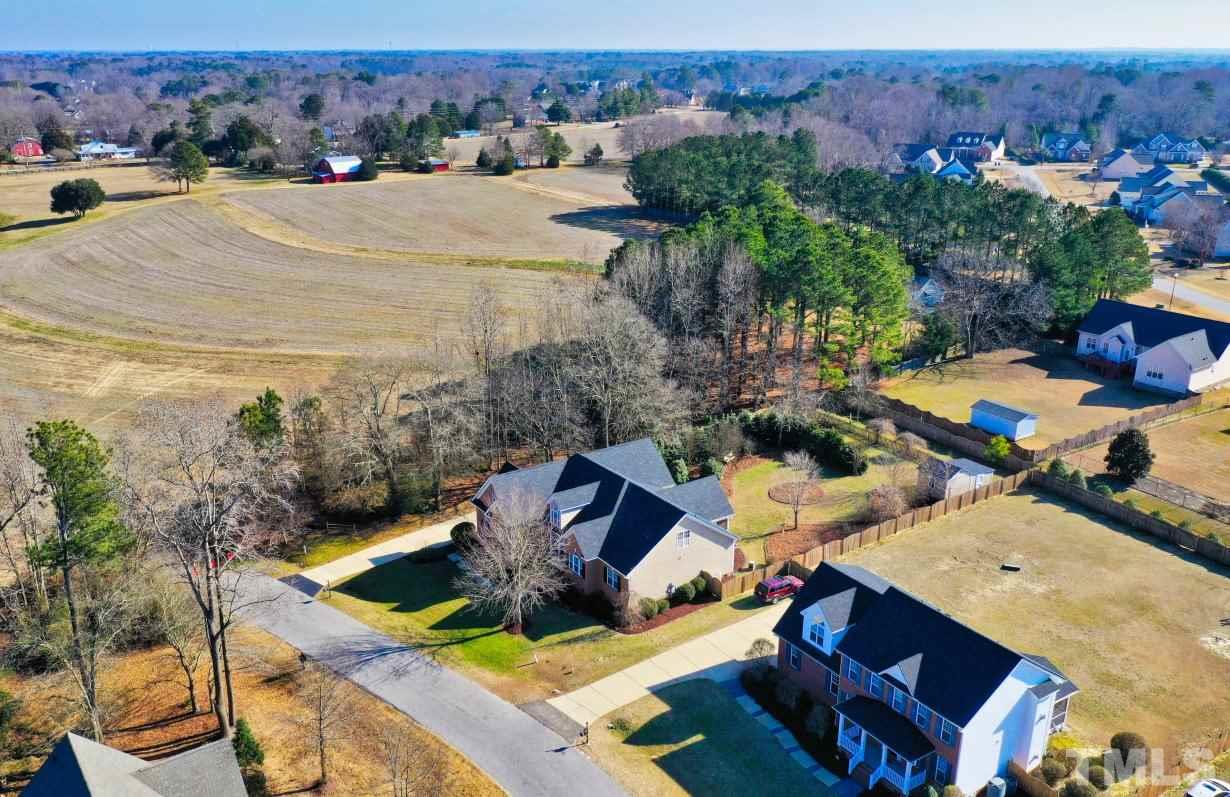 844 Oxen Circle Raleigh, NC 27603 - Photo 25 of 30 an aerial view of a house with yard swimming pool and outdoor seating