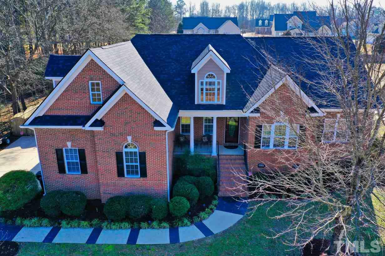 844 Oxen Circle Raleigh, NC 27603 - Photo 26 of 30 a front view of a house with a yard