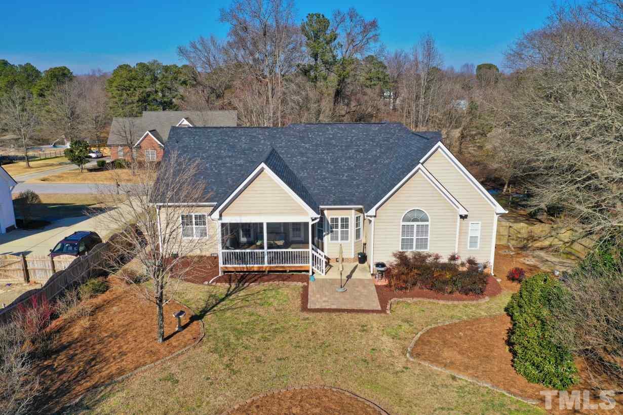 844 Oxen Circle Raleigh, NC 27603 - Photo 28 of 30 a view of a house with a yard and roof