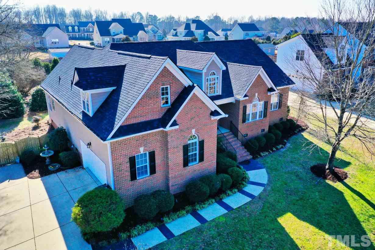 844 Oxen Circle Raleigh, NC 27603 - Photo 30 of 30 a aerial view of a house with a yard