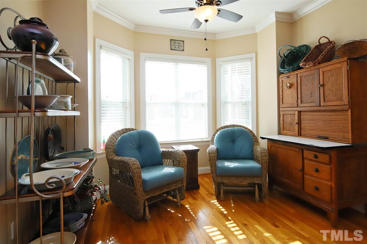 844 Oxen Circle Raleigh, NC 27603 - Photo 10 of 30 a living room with furniture and a window