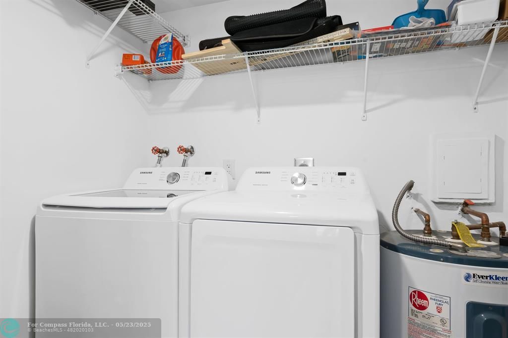 1100 Southeast 5th Court, Unit 33 Pompano Beach, FL 33060 - Photo 25 of 26 a utility room with dryer and washer