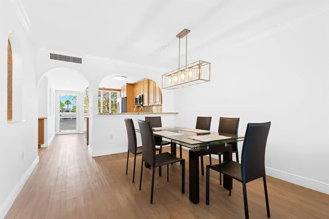 a view of a dining room with furniture