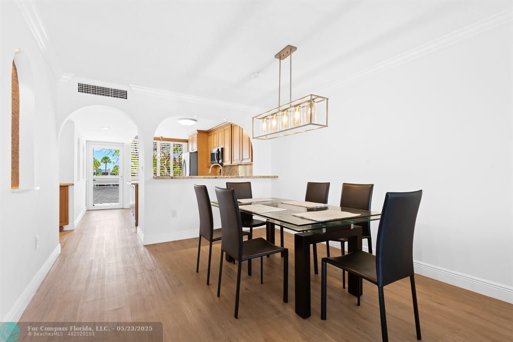 1100 Southeast 5th Court, Unit 33 Pompano Beach, FL 33060 - Photo 5 of 26 a view of a dining room with furniture