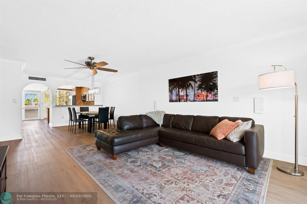 1100 Southeast 5th Court, Unit 33 Pompano Beach, FL 33060 - Photo 8 of 26 a living room with furniture and wooden floor