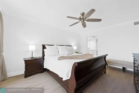 a bed room with a bed and a window