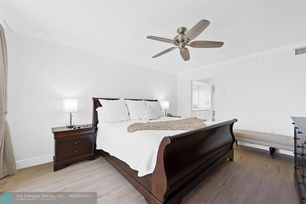 1100 Southeast 5th Court, Unit 33 Pompano Beach, FL 33060 - Photo 10 of 26 a bed room with a bed and a window