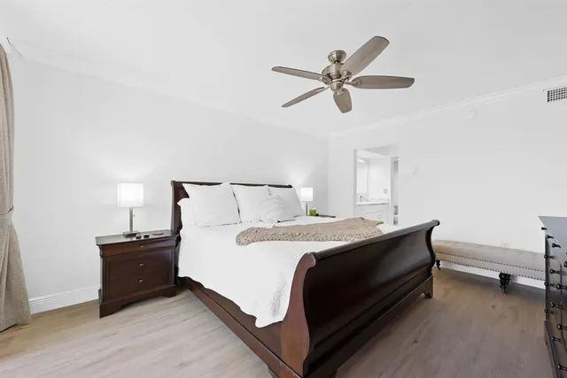 a bed room with a bed and a window