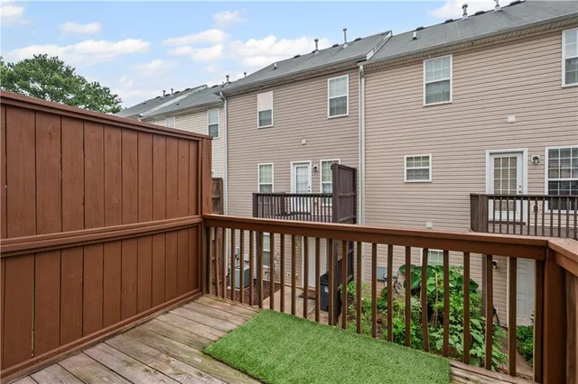 a balcony view with a garden