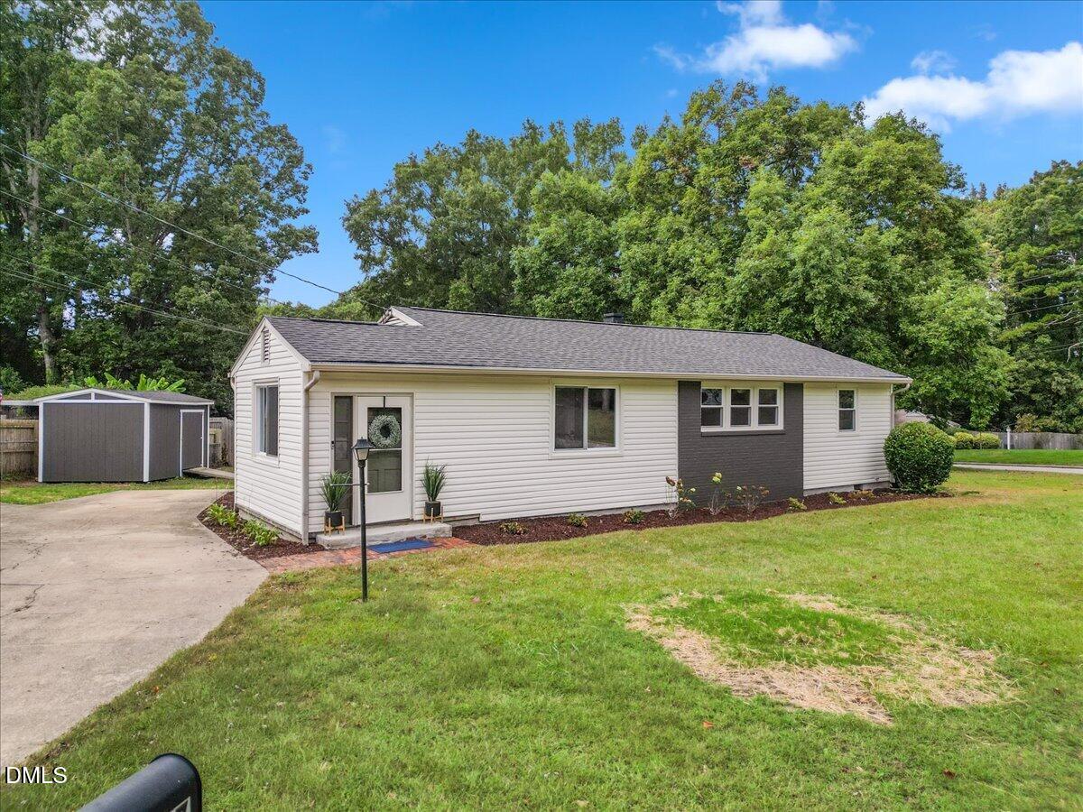 3437 Apache Drive Raleigh, NC 27609 - Photo 4 of 40 Light tone siding