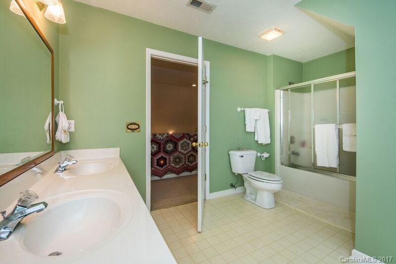 501 Oak Ridge Drive Clyde, NC 28721 - Photo 18 of 24 a bathroom with a sink and toilet