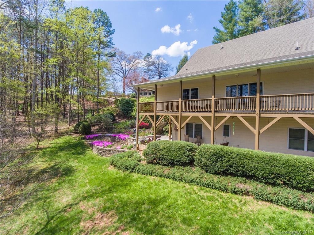 501 Oak Ridge Drive Clyde, NC 28721 - Photo 4 of 24 a view of a house with a backyard