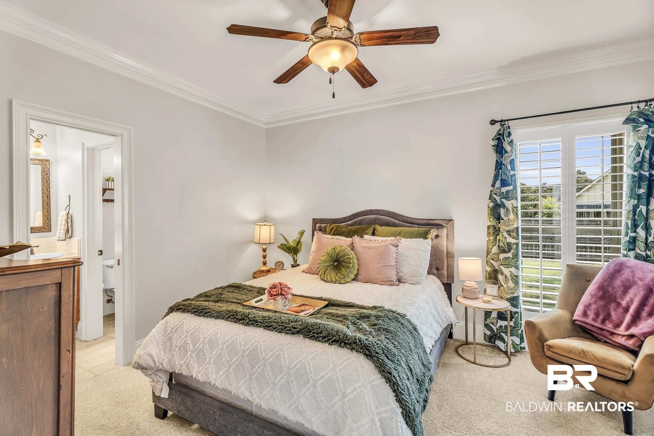 7696 Raegan Lane Daphne, AL 36527 - Photo 24 of 41 Carpeted bedroom featuring ceiling fan, ornamental molding, and ensuite bath