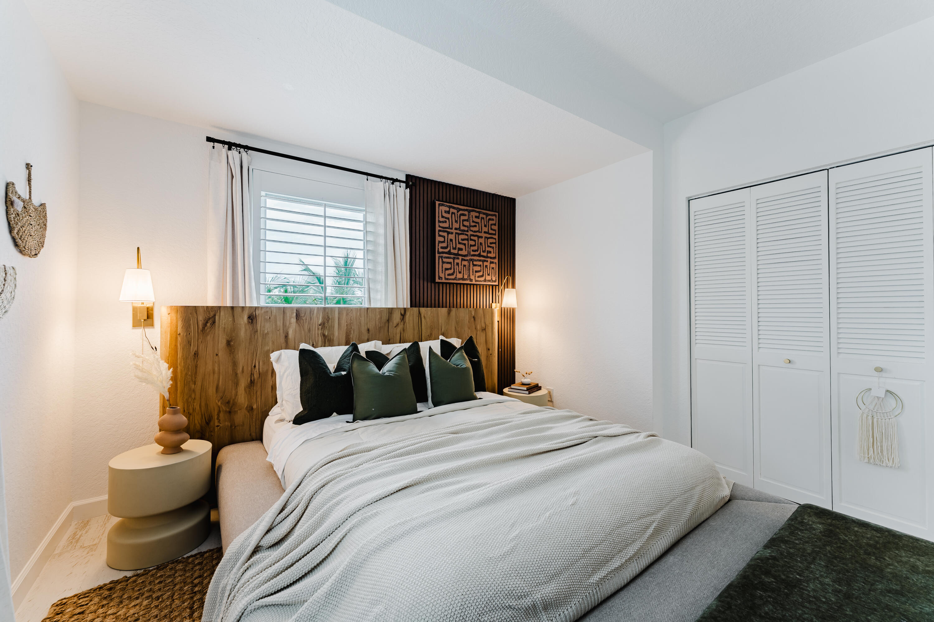 921 Ortega Road West Palm Beach, FL 33405 - Photo 26 of 60 a bedroom with a bed and wooden floor