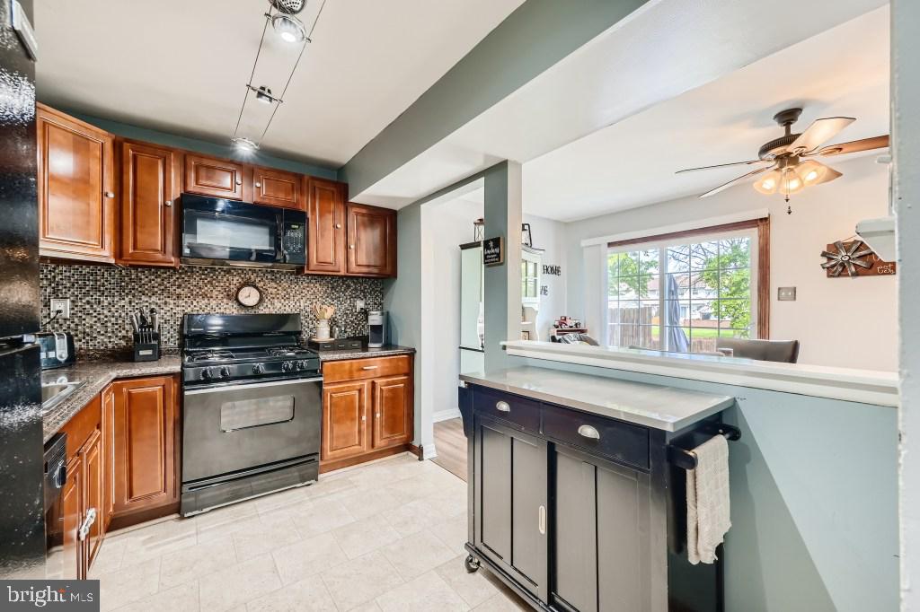9616 Baron Place, Unit 9616 Rosedale, MD 21237 - Photo 12 of 34 Spacious kitchen with pass through window