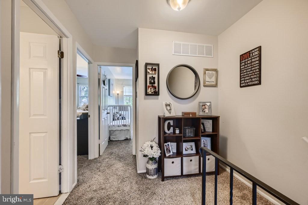 9616 Baron Place, Unit 9616 Rosedale, MD 21237 - Photo 16 of 34 2nd level hallway