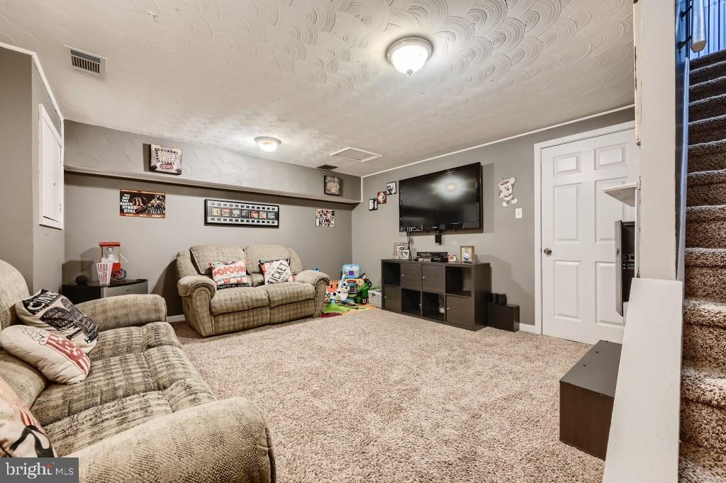 9616 Baron Place, Unit 9616 Rosedale, MD 21237 - Photo 24 of 34 Awesome basement family room