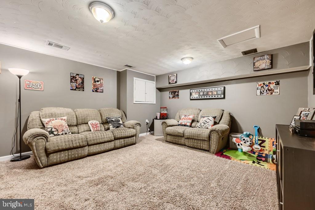 9616 Baron Place, Unit 9616 Rosedale, MD 21237 - Photo 25 of 34 Lots of space in the family room