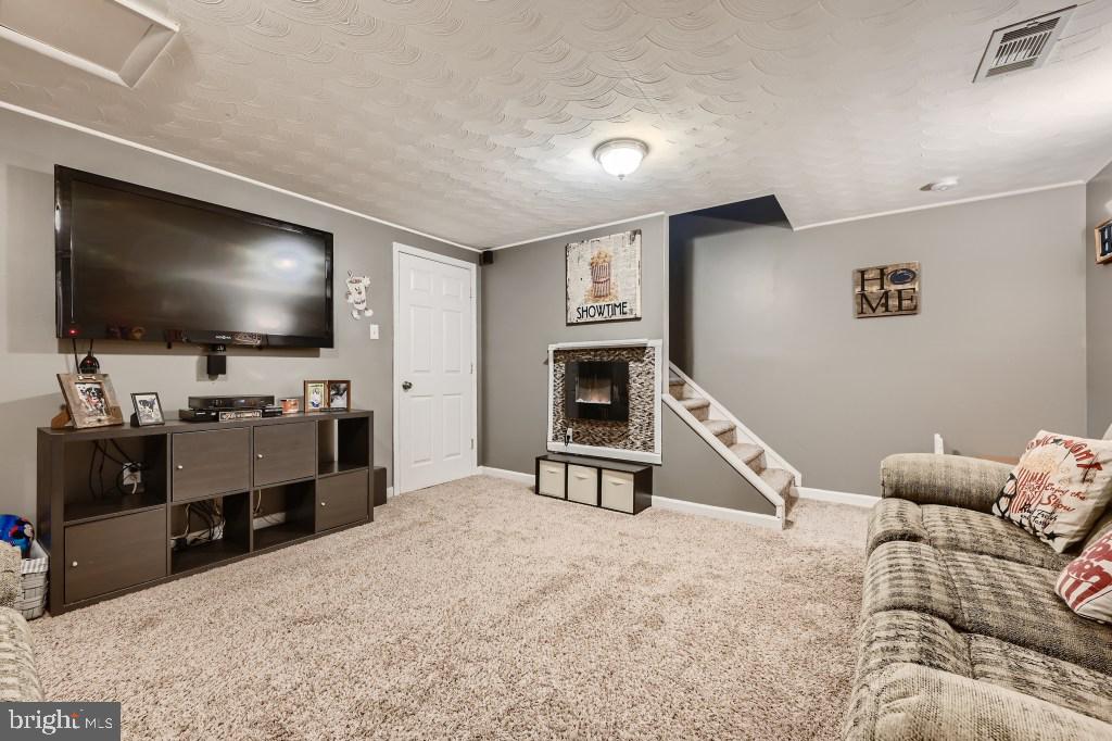 9616 Baron Place, Unit 9616 Rosedale, MD 21237 - Photo 26 of 34 This is a great entertaining room