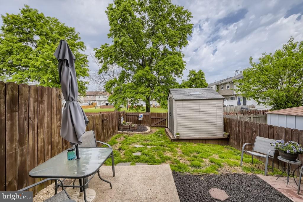 9616 Baron Place, Unit 9616 Rosedale, MD 21237 - Photo 27 of 34 Concrete patio in backyard / fenced in