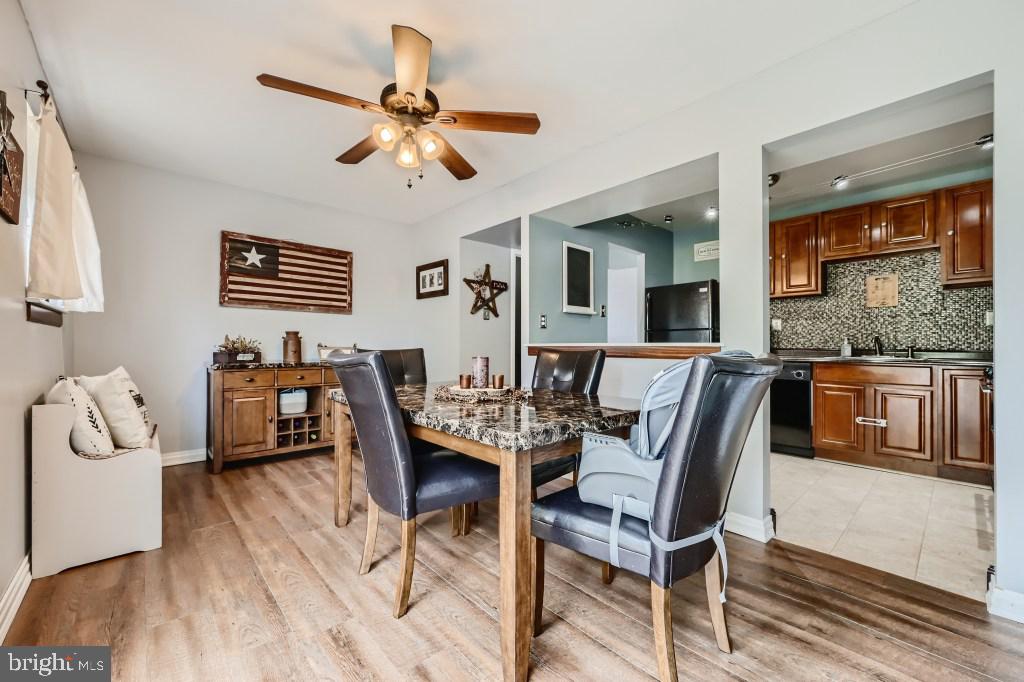 9616 Baron Place, Unit 9616 Rosedale, MD 21237 - Photo 10 of 34 Lighted ceiling fan in dining room