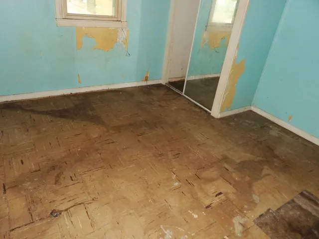 an empty room with windows