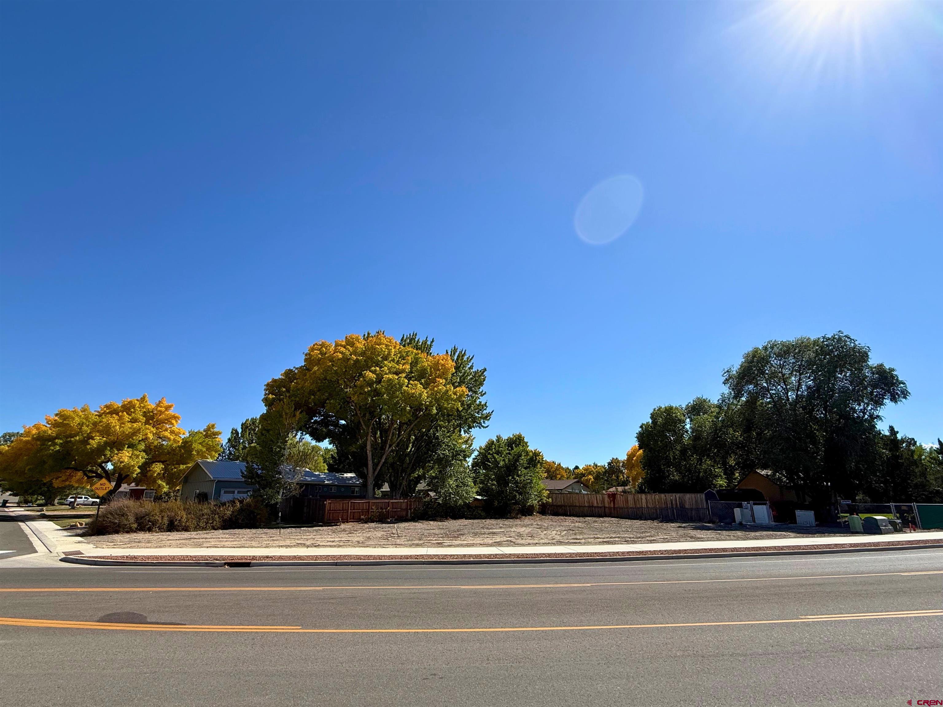 Tbd Lot 3 Woodgate Road Montrose, CO 81401 - Photo 2 of 2 a view of a house and a yard