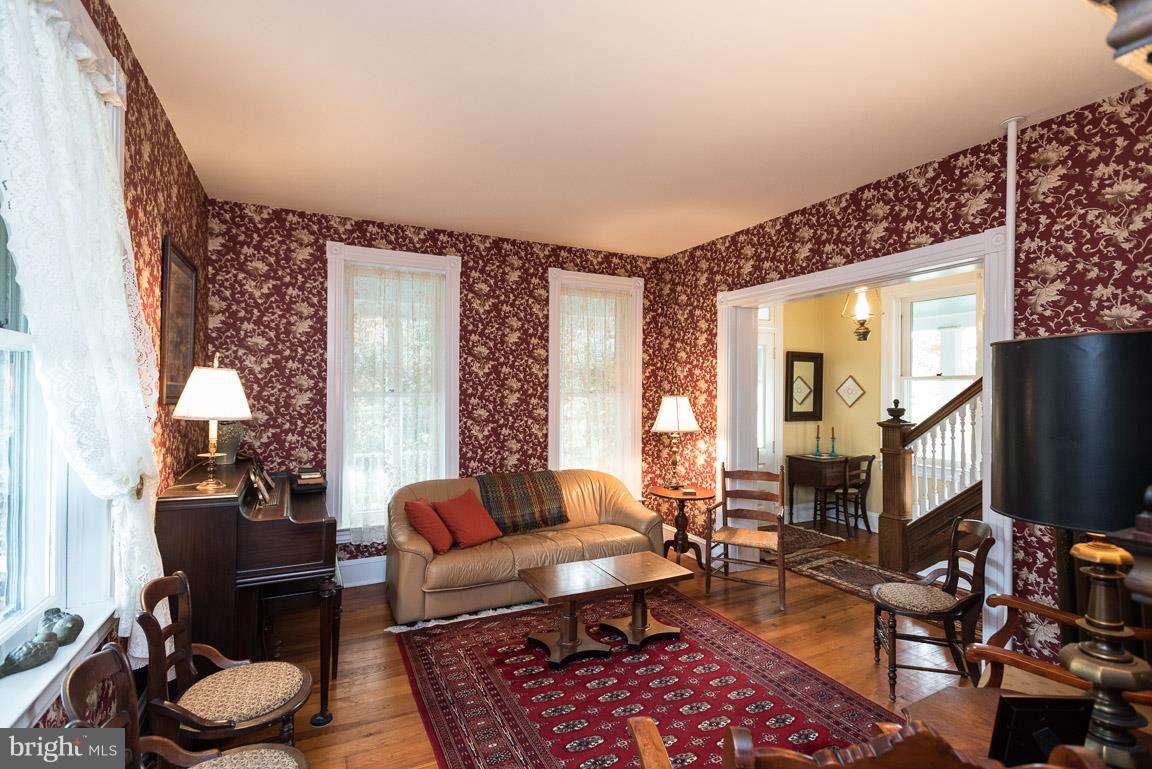 4314 Beckleysville Road Hampstead, MD 21074 - Photo 23 of 48 Living room with beautiful floors and windows.