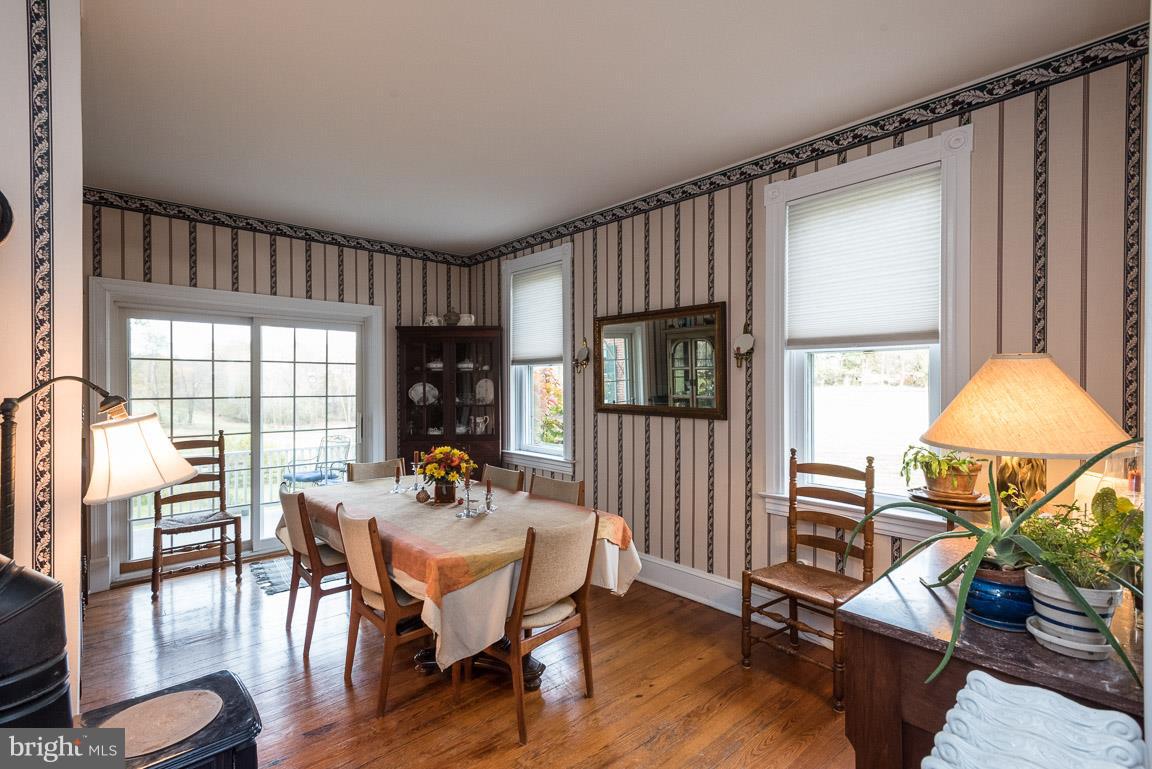 4314 Beckleysville Road Hampstead, MD 21074 - Photo 25 of 48 Dining room with sliders to rear covered porch.