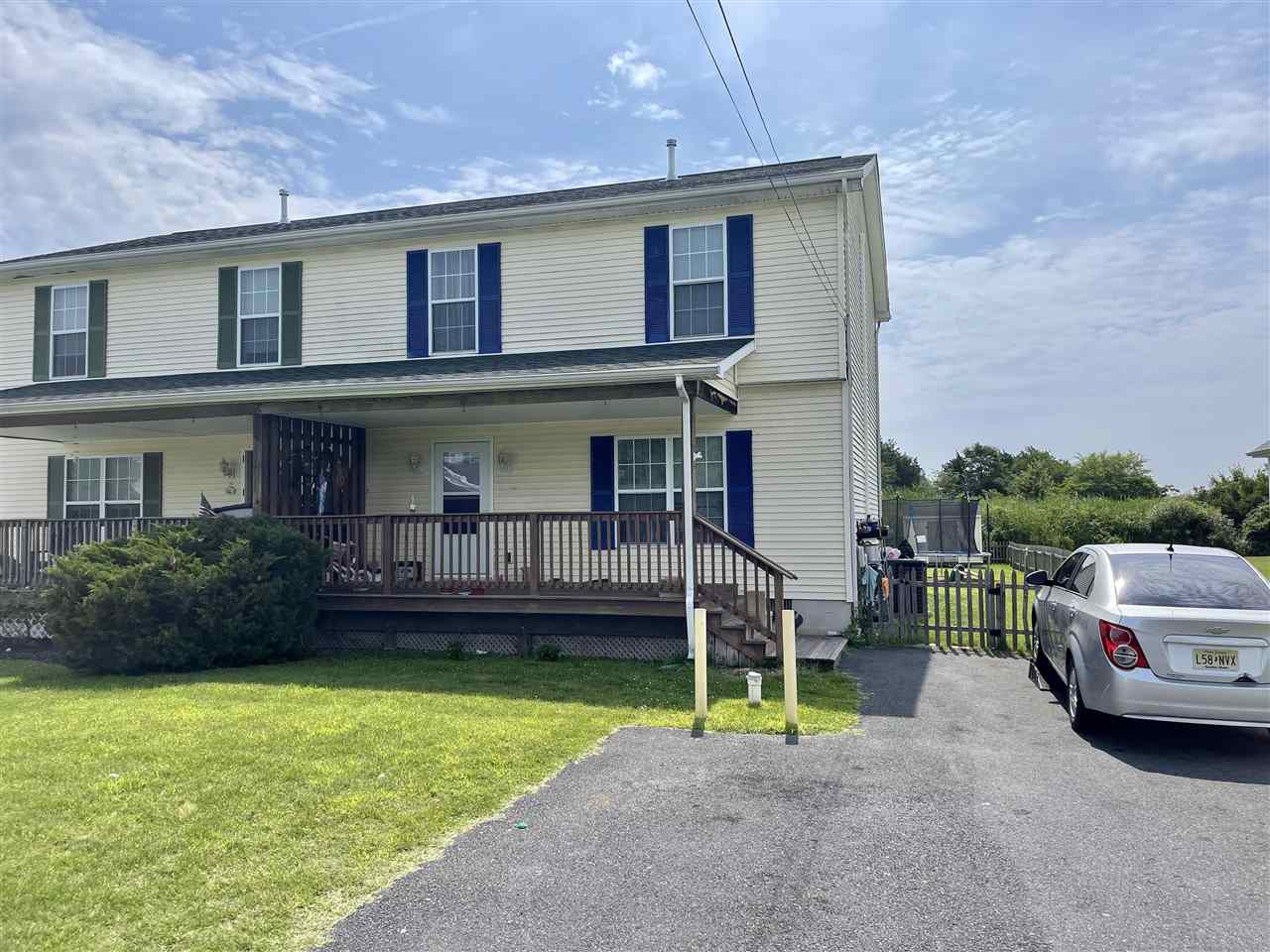 408 North 7th, Unit B Rio Grande, NJ 08242 - Photo 1 of 1 a view of a house with a yard and furniture