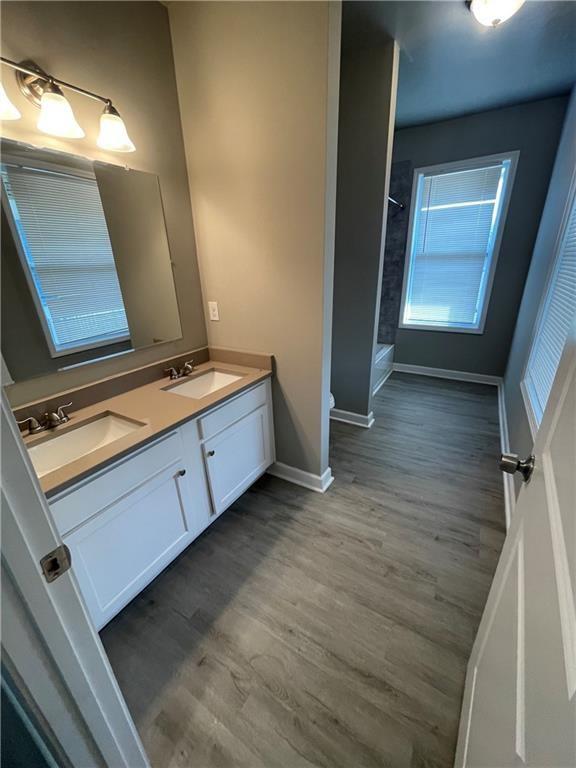 1155 Lucile Avenue Southwest, Unit 1 Atlanta, GA 30310 - Photo 7 of 10 a view of a hallway with wooden floor