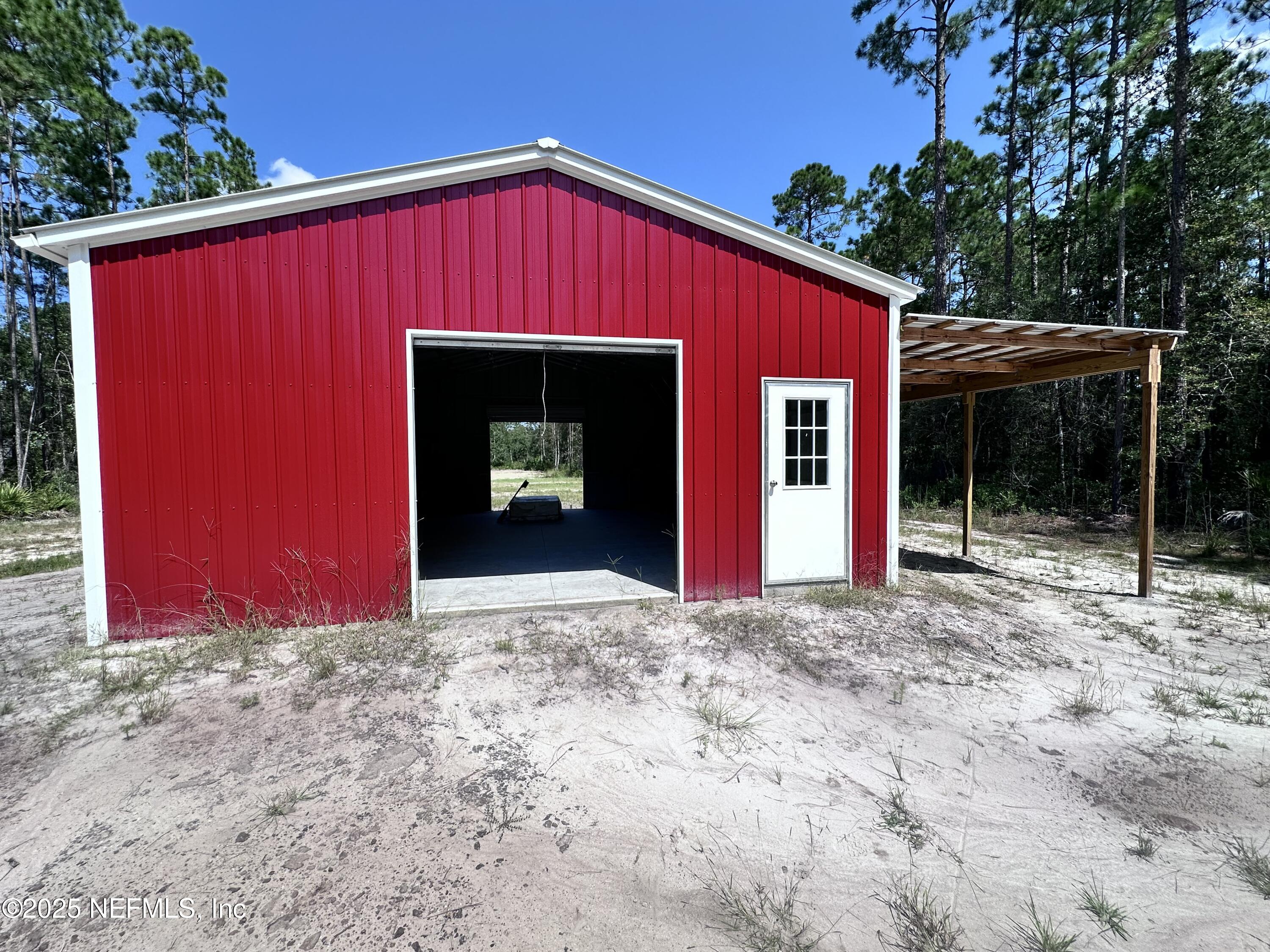 3269 Lannie Road Jacksonville, FL 32218 - Photo 4 of 7 a front view of a house with a yard