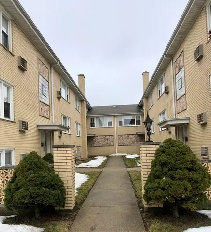 a view of a street with buildings