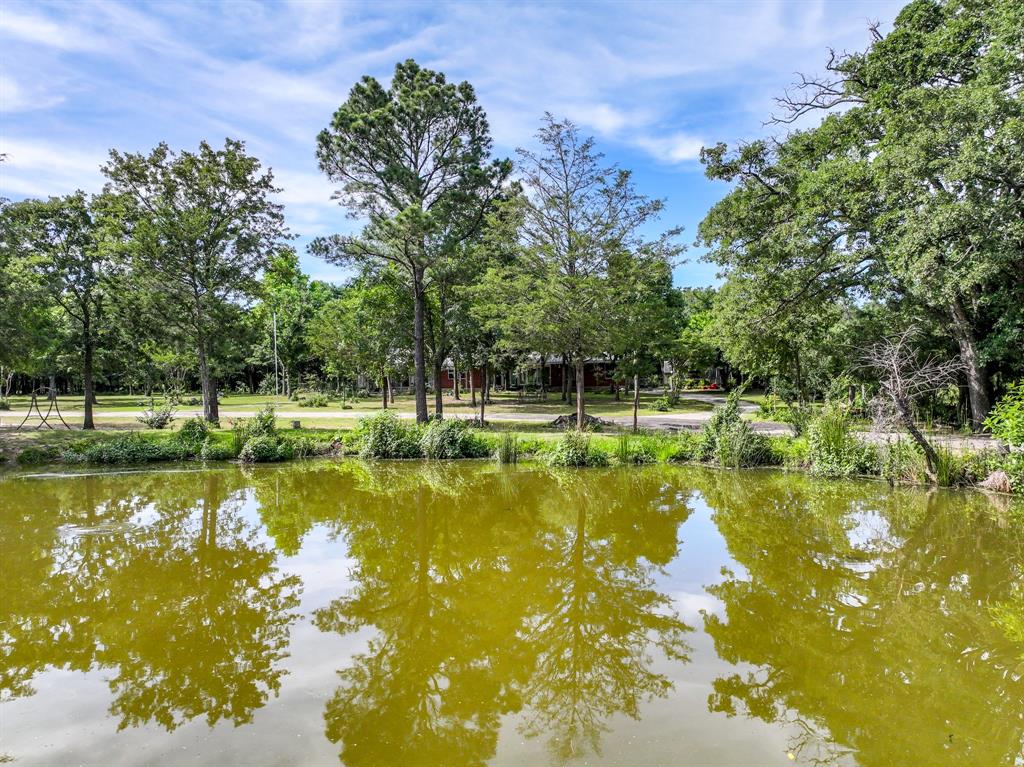 211 Rs County Road 1455 Point, TX 75472 - Photo 15 of 40 a view of a swimming pool with a patio