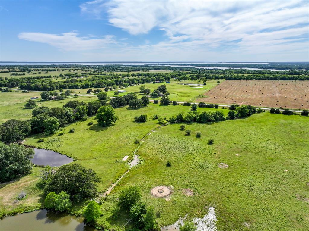 211 Rs County Road 1455 Point, TX 75472 - Photo 27 of 40 a view of a lake with houses in the back