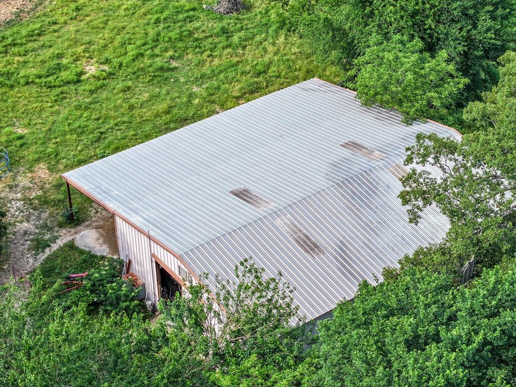 211 Rs County Road 1455 Point, TX 75472 - Photo 35 of 40 a backyard of a house with lots of green space