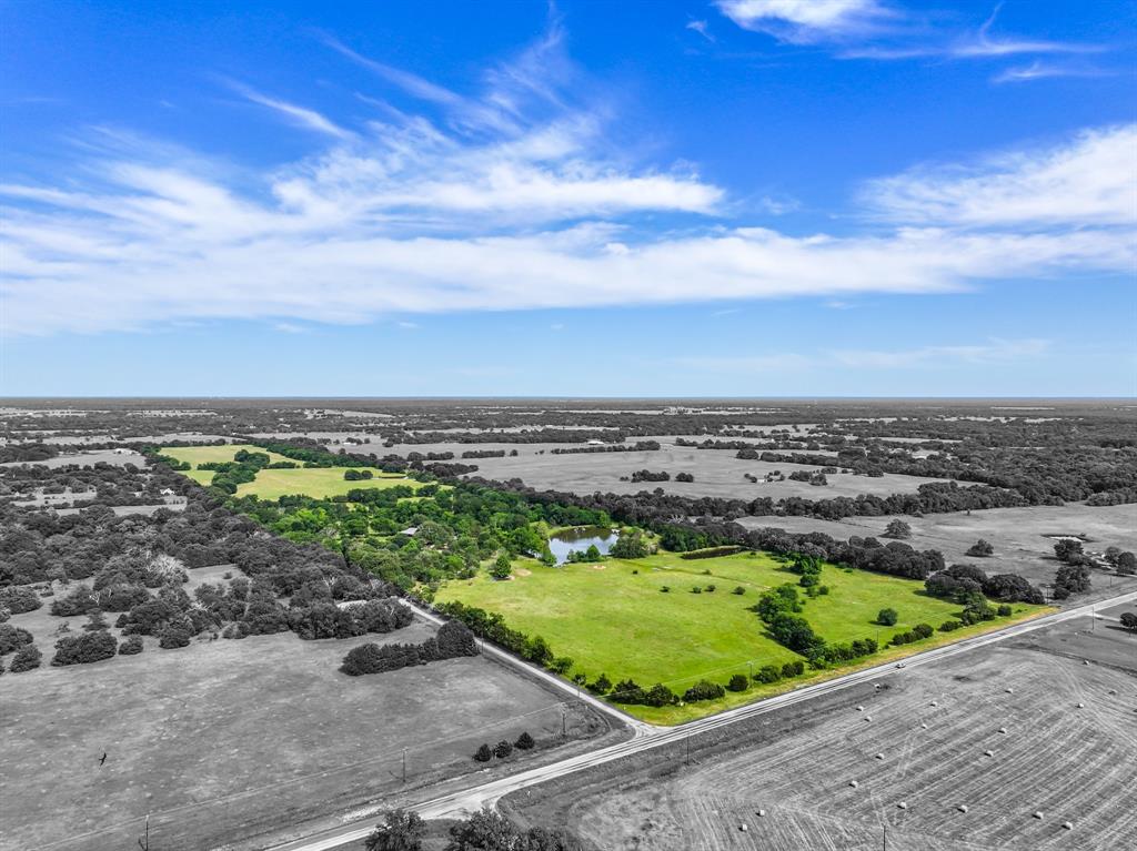 211 Rs County Road 1455 Point, TX 75472 - Photo 6 of 40 a view of a lake with a city view