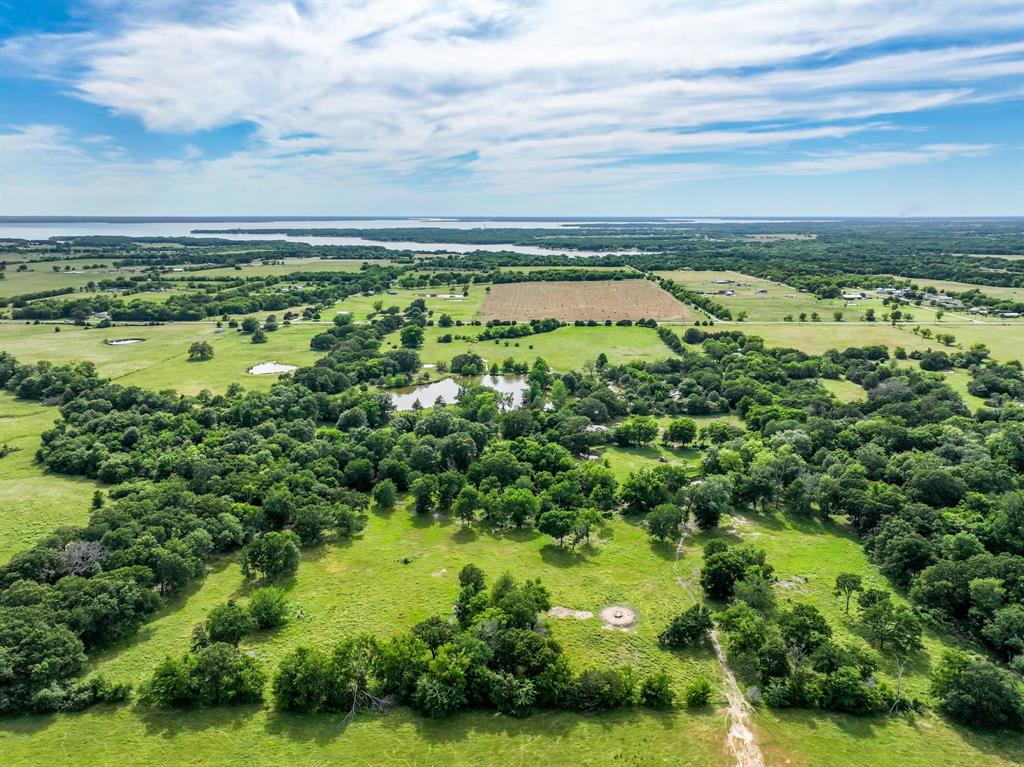 211 Rs County Road 1455 Point, TX 75472 - Photo 7 of 40 a view of yard with ocean view