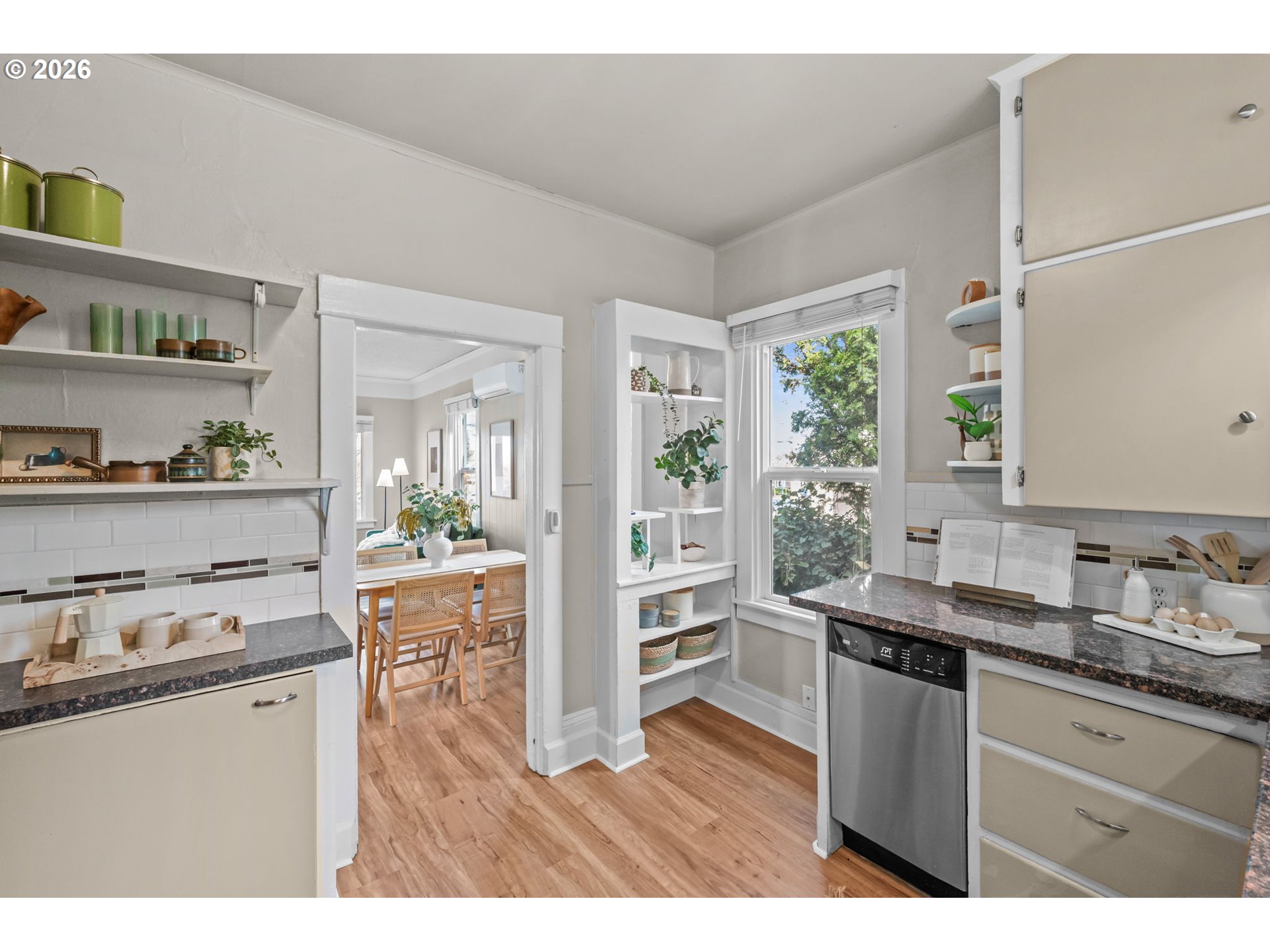 326 Pearl Street Oregon City, OR 97045 - Photo 16 of 36 a kitchen with a sink cabinets and wooden floor